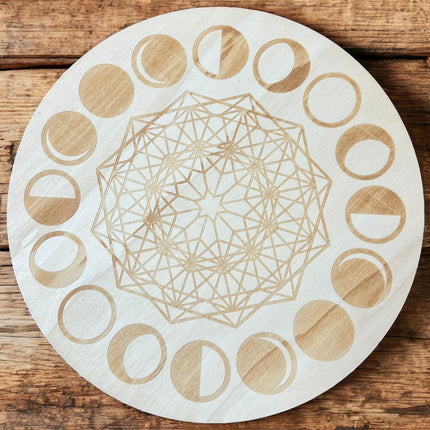 12-inch wooden engraved moon phase crystal grid with geometric patterns - Raven's Cauldron, 6 N Sandusky St, Delaware, OH 43015