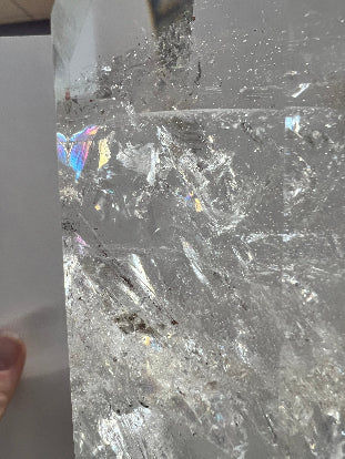 up close photo of the imperfections inside a clear quartz tower