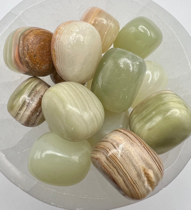 Mexican Onyx crystal and carved stone collection at Raven's Cauldron