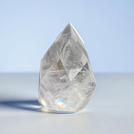 Clear Quartz faceted flame crystal weighing 145 grams with polished surfaces and natural transparency, Raven's Cauldron, Delaware, OH