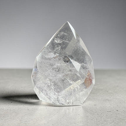 Clear Quartz faceted flame crystal weighing 145 grams with polished surfaces and natural transparency, Raven's Cauldron, Delaware, OH
