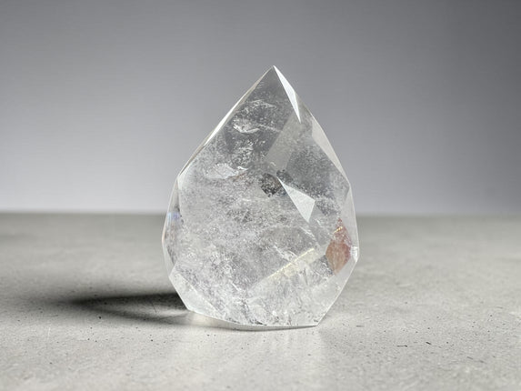Clear Quartz faceted flame crystal weighing 145 grams with polished surfaces and natural transparency, Raven's Cauldron, Delaware, OH