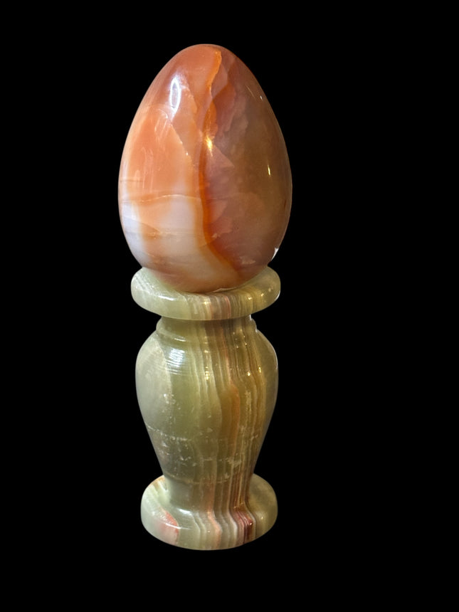 Shop high-quality Carnelian crystal eggs sold by weight. Ideal for sacral chakra healing, energy boosting, rituals & spiritual home decor. Raven’s Cauldron.