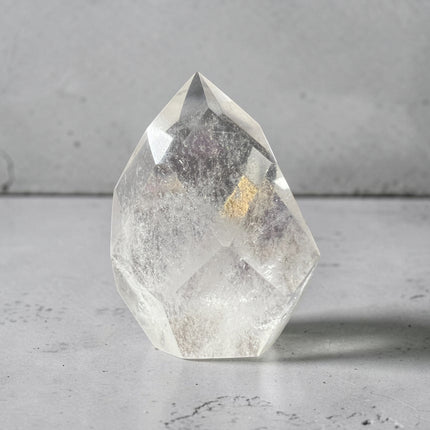 Clear Quartz faceted flame crystal weighing 172 grams with polished finish and natural clarity from Raven's Cauldron, Delaware, OH