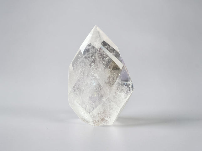 Clear Quartz faceted flame crystal weighing 172 grams with polished finish and natural clarity from Raven's Cauldron, Delaware, OH