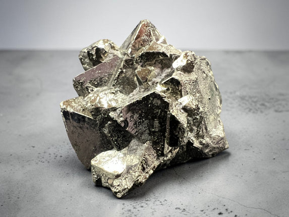 Geometric Pyrite crystal specimen from Huanzala Mine Peru in magnification box – Raven's Cauldron, Delaware, OH