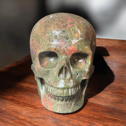 1521g Unakite crystal skull in earthy green and pink tones – Raven’s Cauldron, 6 N Sandusky St, Delaware, OH 43015
