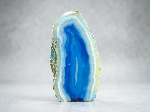 Dyed Blue Agate polished freeform with cut base 104 grams calming communication crystal Raven’s Cauldron Delaware Ohio
