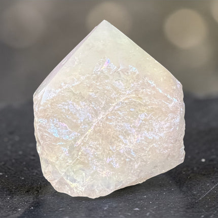 Angel Aura Quartz semi-polished crystal point for spiritual connection, joy, and crown chakra energy from Raven's Cauldron, 6 N Sandusky St, Delaware, OH 43015