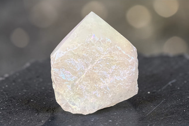 Angel Aura Quartz semi-polished crystal point for spiritual connection, joy, and crown chakra energy from Raven's Cauldron, 6 N Sandusky St, Delaware, OH 43015