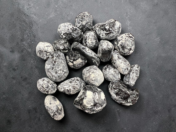 Natural Apache Tears Obsidian crystal polished volcanic glass protection stone for grounding and emotional healing from Raven’s Cauldron, Delaware, OH