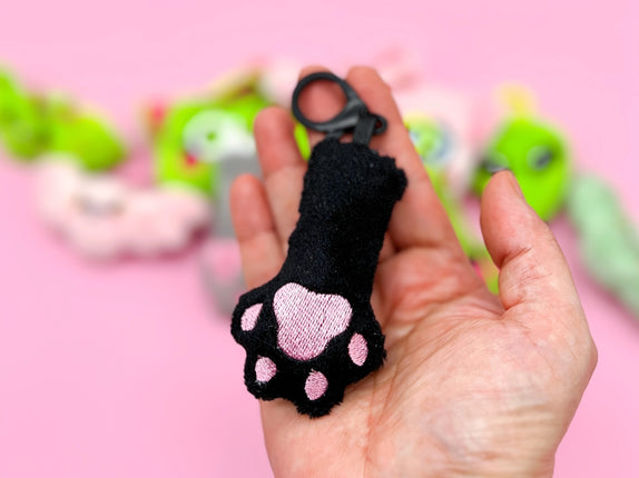 Plush cat paw bag charm keychain by Kawaii Hair Candy with soft kawaii kitty paw design

