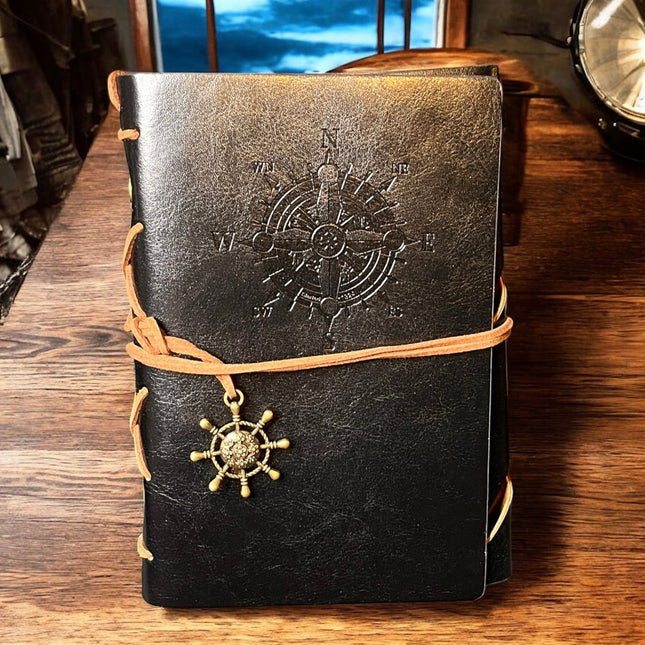 black journal with nautical compass detail