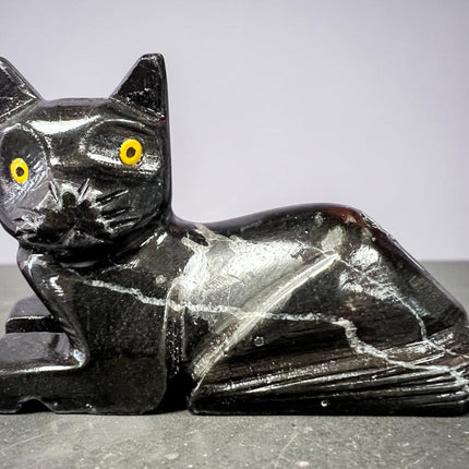 Black Calcite cat figurine hand carved polished crystal laying down for grounding protection energy clearing Raven’s Cauldron, 6 N Sandusky St, Delaware, OH 43015