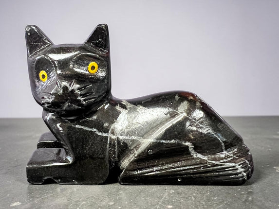 Black Calcite cat figurine hand carved polished crystal laying down for grounding protection energy clearing Raven’s Cauldron, 6 N Sandusky St, Delaware, OH 43015