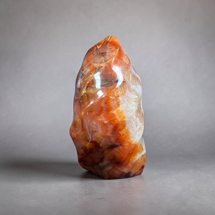 447 gram polished Carnelian Flame crystal with vibrant orange and red coloring for creativity, confidence, motivation, and Sacral Chakra work. Raven's Cauldron, Delaware, OH