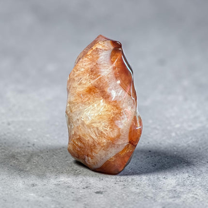447 gram polished Carnelian Flame crystal with vibrant orange and red coloring for creativity, confidence, motivation, and Sacral Chakra work. Raven's Cauldron, Delaware, OH