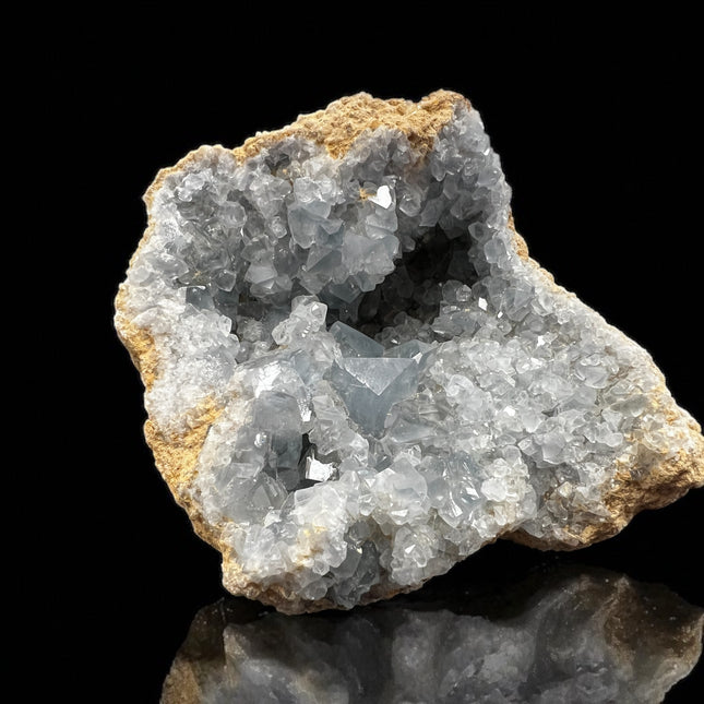 High-quality Celestite crystal cluster weighing 2.16 lbs with stunning blue crystals, perfect for peace, spiritual clarity, and angelic connection – Raven’s Cauldron. 6 N. Sandusky St., Delaware, OH 43015

