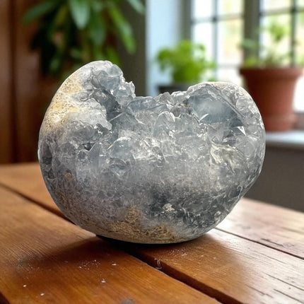 High-quality Celestite geode with light blue crystals, weighing 3.06 lbs and measuring 3.75 x 3 inches – perfect for spiritual peace and clarity. Raven's Cauldron, 6 N. Sandusky St., Delaware, OH 43015