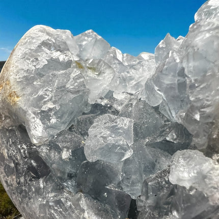 High-quality Celestite geode with light blue crystals, weighing 3.06 lbs and measuring 3.75 x 3 inches – perfect for spiritual peace and clarity. Raven's Cauldron, 6 N. Sandusky St., Delaware, OH 43015