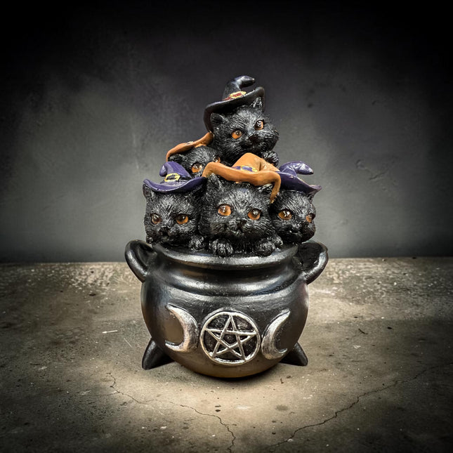 Nemesis Now Five Cheeky Cats in Cauldron resin figurine featuring five black kittens peeking from a witch's cauldron.