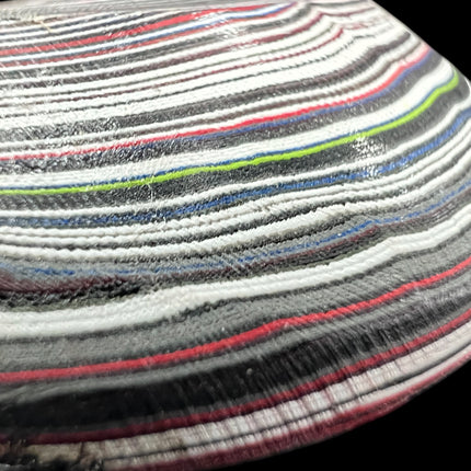 Polished Fordite Detroit Motor City Agate stone with colorful layered bands measuring 1.5 inches , Raven's Cauldron, 6 N Sandusky St, Delaware, OH 43015