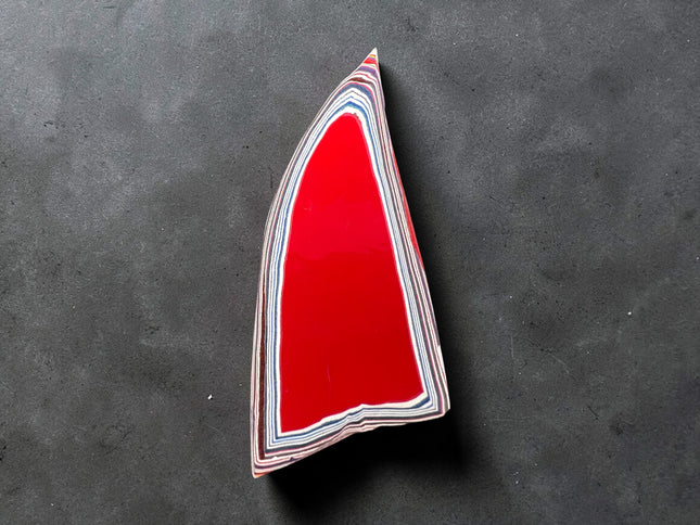 Polished Fordite Detroit Motor City Agate with colorful layered automotive paint bands, 9 grams, 3 inches long, Raven's Cauldron, 6 N Sandusky St, Delaware, OH 43015