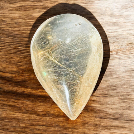 Golden Rutilated Quartz tear drop palm stone – small polished crystal, Raven’s Cauldron, 6 N Sandusky St, Delaware, OH 43015