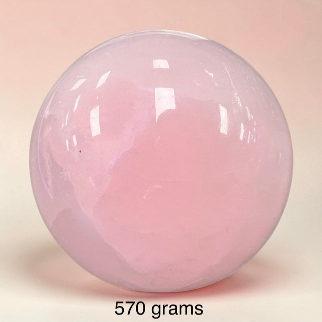 UV Reactive Mangano Calcite Sphere – Pink Crystal Sphere (561g 2.5” or 570g 2.75”)