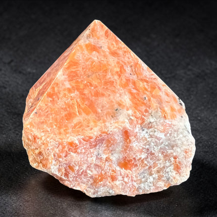 Orchid Calcite semi-polished crystal point for creativity and sacral chakra energy from Raven's Cauldron, 6 N Sandusky St, Delaware, OH 43015