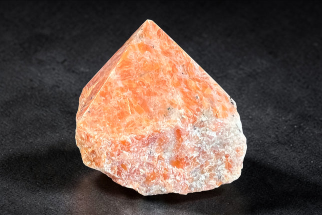 Orchid Calcite semi-polished crystal point for creativity and sacral chakra energy from Raven's Cauldron, 6 N Sandusky St, Delaware, OH 43015