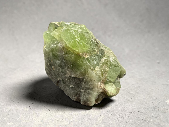 Natural Peridot in Matrix crystal specimen from Pakistan weighing 117 grams with vivid green Peridot and minimal matrix, Raven's Cauldron, Delaware, OH