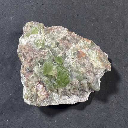 Natural Peridot in Matrix crystal specimen from Pakistan weighing 120 grams with vibrant green Peridot crystals in host rock – Raven's Cauldron, Delaware, OH