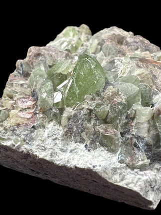 Natural Peridot in Matrix crystal specimen from Pakistan weighing 120 grams with vibrant green Peridot crystals in host rock – Raven's Cauldron, Delaware, OH