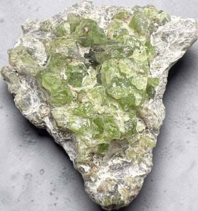 Natural Peridot in Matrix specimen from Pakistan featuring a double-terminated Peridot crystal, 206 grams, 3.5 x 2.75 x 1 inches – Raven's Cauldron, Delaware, OH