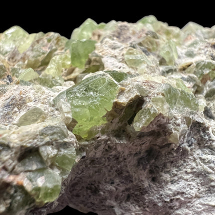 Natural Peridot in Matrix crystal specimen from Pakistan weighing 210 grams with vibrant green Peridot crystals in host rock – Raven's Cauldron, Delaware, OH

Secondary Image Alt Text: