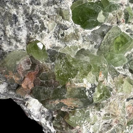 Natural Peridot in Matrix crystal specimen from Pakistan weighing 307 grams with vibrant green Peridot crystals in host rock, Raven's Cauldron, Delaware, OH.