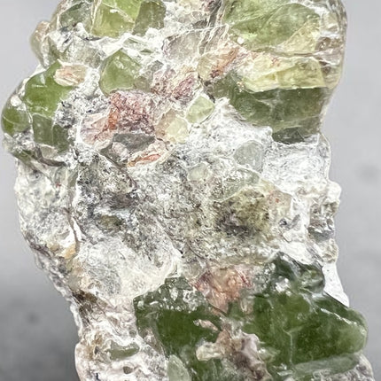 Natural Peridot in Matrix crystal specimen from Pakistan featuring bright green Peridot crystals in host rock, 57 grams, 2.25 x 1 x 1.25 inches – Raven's Cauldron, Delaware, OH