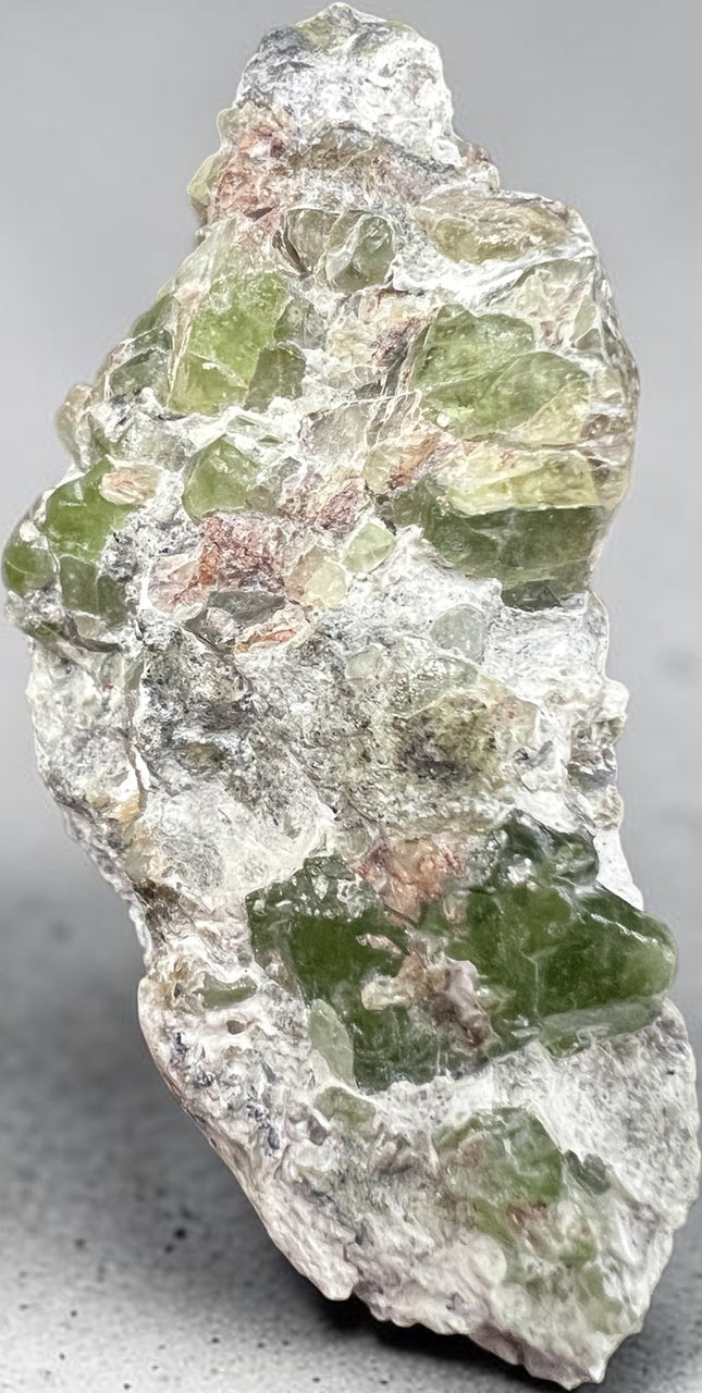 Natural Peridot in Matrix crystal specimen from Pakistan featuring bright green Peridot crystals in host rock, 57 grams, 2.25 x 1 x 1.25 inches – Raven's Cauldron, Delaware, OH