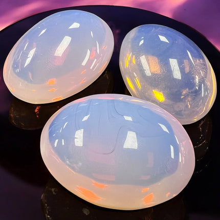 2-inch Pink Opalite palm stone with polished finish, crystal for love and healing – Raven's Cauldron, 6 N Sandusky St, Delaware, OH 43015