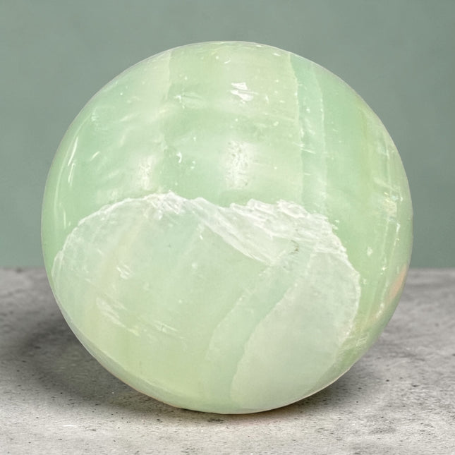 Pistachio Calcite Sphere – 622g (2.75” / 69.85mm) Polished Green Calcite Crystal Ball
