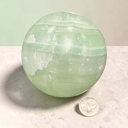 Pistachio Calcite Sphere – 622g (2.75” / 69.85mm) Polished Green Calcite Crystal Ball