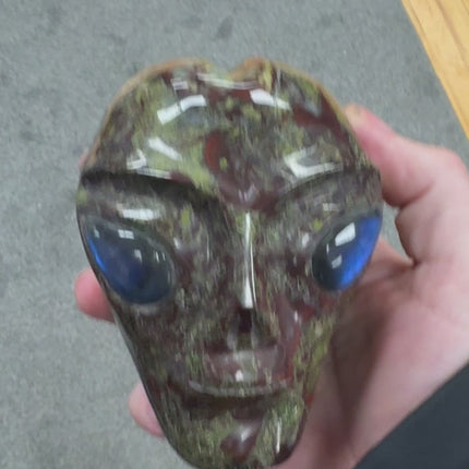 Dragon's Blood Jasper Alien Skull Carving With Labradorite Eyes