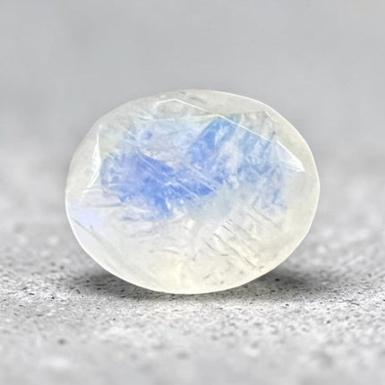 Natural Rainbow Moonstone faceted oval loose gemstone, 12x10mm undrilled jewelry stone with brilliant blue flash, perfect for custom jewelry making and gemstone collections – Raven's Cauldron, Delaware, OH