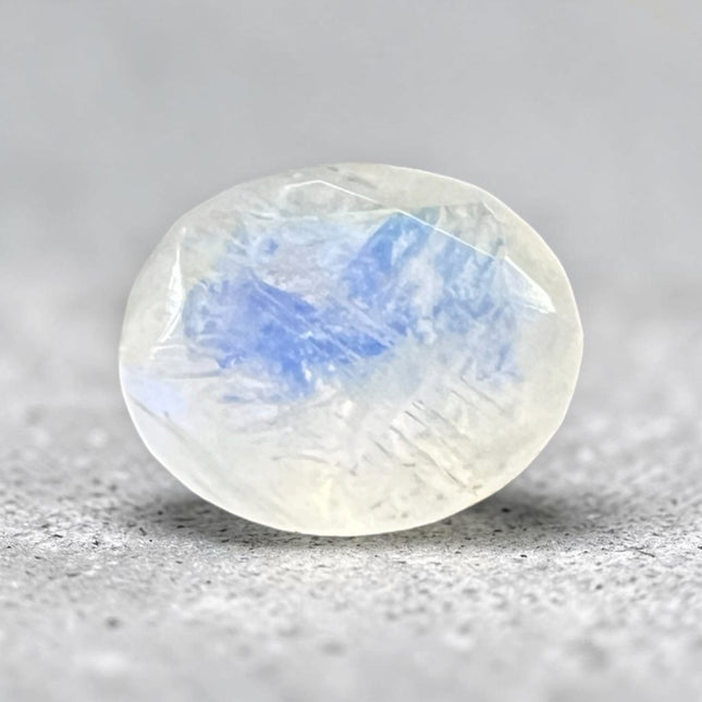 Natural Rainbow Moonstone faceted oval loose gemstone, 12x10mm undrilled jewelry stone with brilliant blue flash, perfect for custom jewelry making and gemstone collections – Raven's Cauldron, Delaware, OH