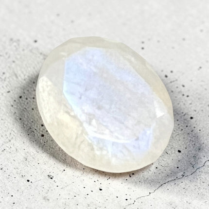 Natural Rainbow Moonstone faceted oval loose gemstone, 12x10mm undrilled jewelry stone with brilliant blue flash, perfect for custom jewelry making and gemstone collections – Raven's Cauldron, Delaware, OH