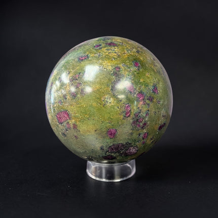 Large polished Ruby in Fuchsite crystal sphere weighing 1931 grams and measuring approximately 3.75 inches, featuring vibrant green fuchsite with natural deep ruby inclusions.