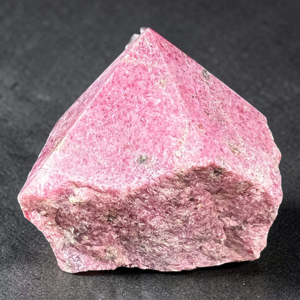 Rhodonite semi-polished crystal point for emotional healing and heart chakra energy from Raven's Cauldron, 6 N Sandusky St, Delaware, OH 43015