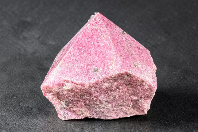 Rhodonite semi-polished crystal point for emotional healing and heart chakra energy from Raven's Cauldron, 6 N Sandusky St, Delaware, OH 43015