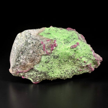 Collector's grade 2,230 gram Ruby in Zoisite featuring vibrant low-iron raw ruby crystal clusters within natural green zoisite matrix displayed as a one-of-a-kind mineral specimen.